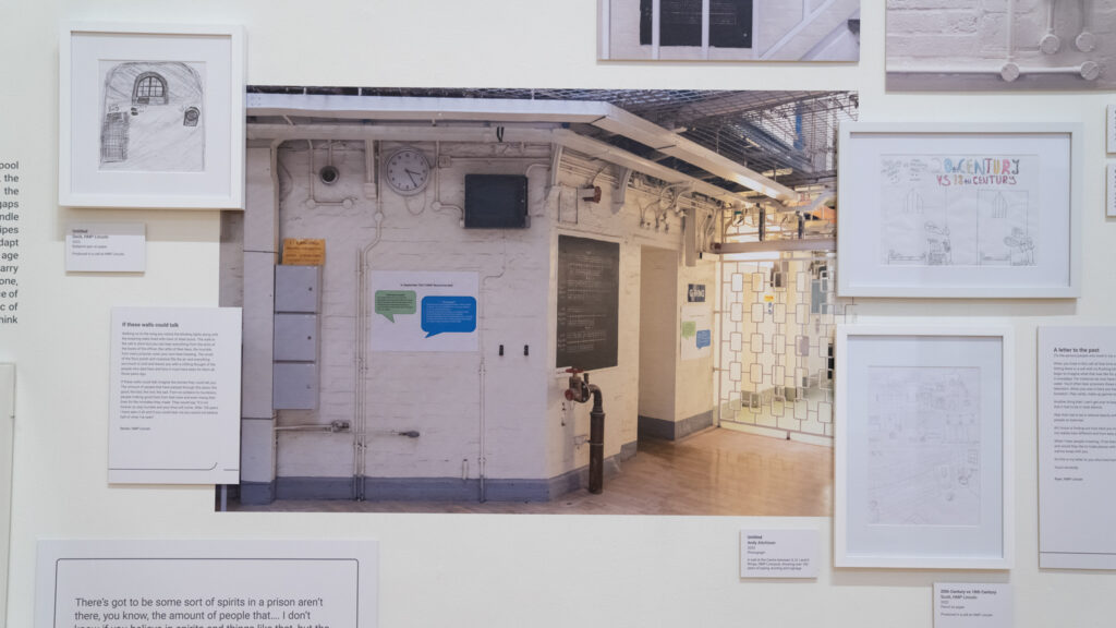A well at the Centre between G, H, I and K Wings, HMP Liverpool, showing over 150 years of piping, ducting and signage, 2023.